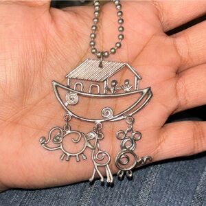 Noah's Ark themed charm necklace with a ball chain.